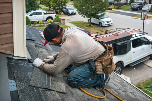 Professional Roofing technician working in Saranac Lake, NY